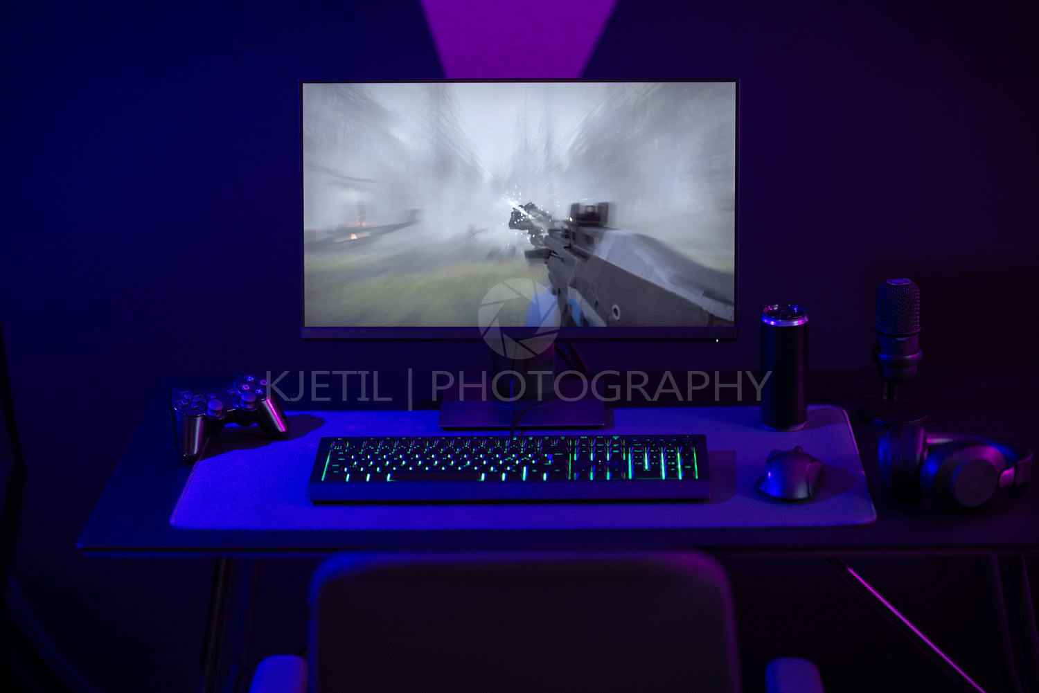 Professional LED lid e-sport gaming studio with first-person shooter online video game on computer monitor