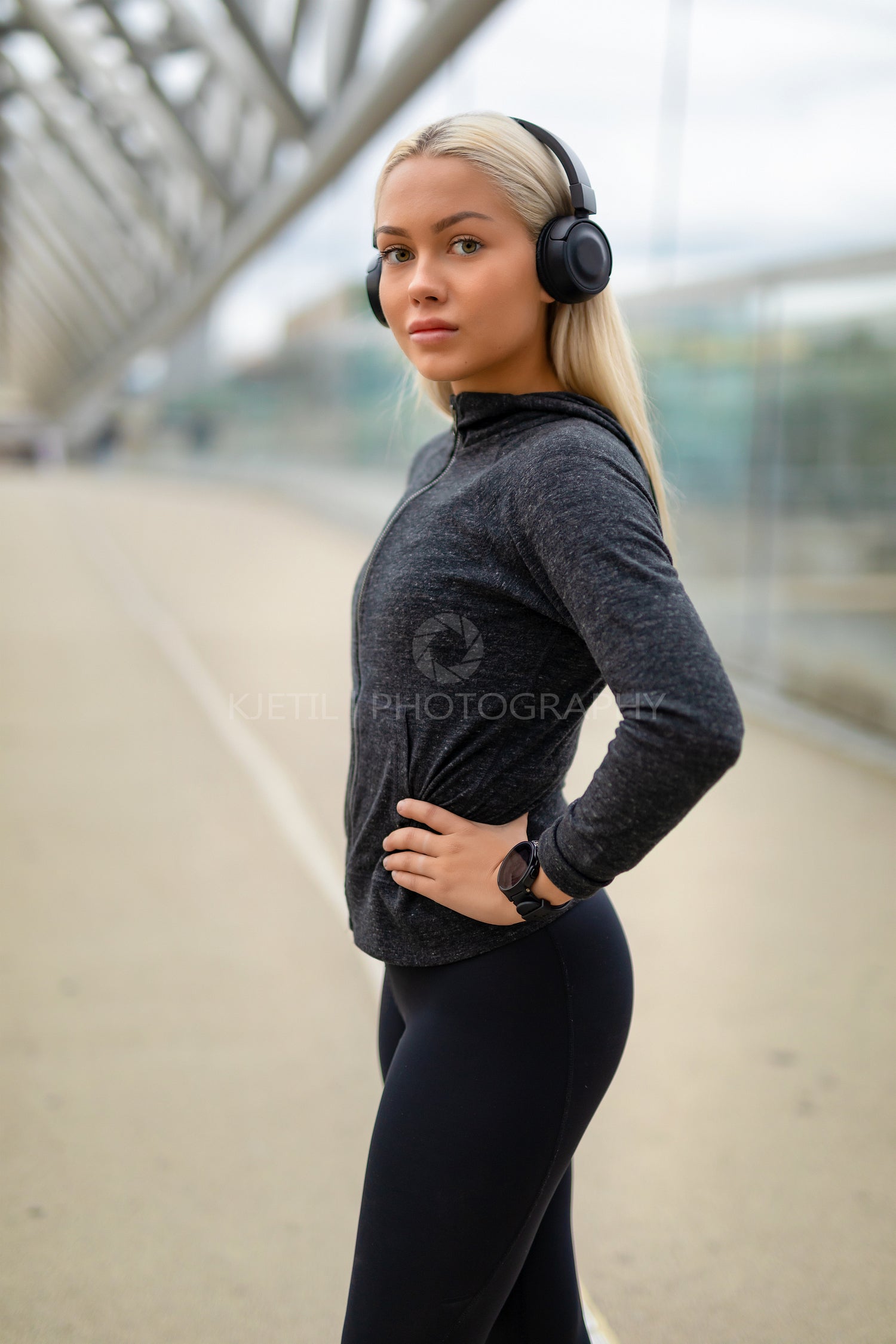 Close-up of Woman in Black Workout Outfit Listen To Music on Headphones