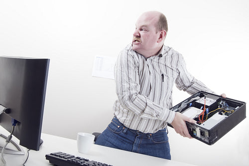 Angry Businessman with Computer Problems