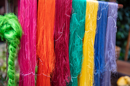 Colorful Silk Yarns Hanging At Manufacturing Factory