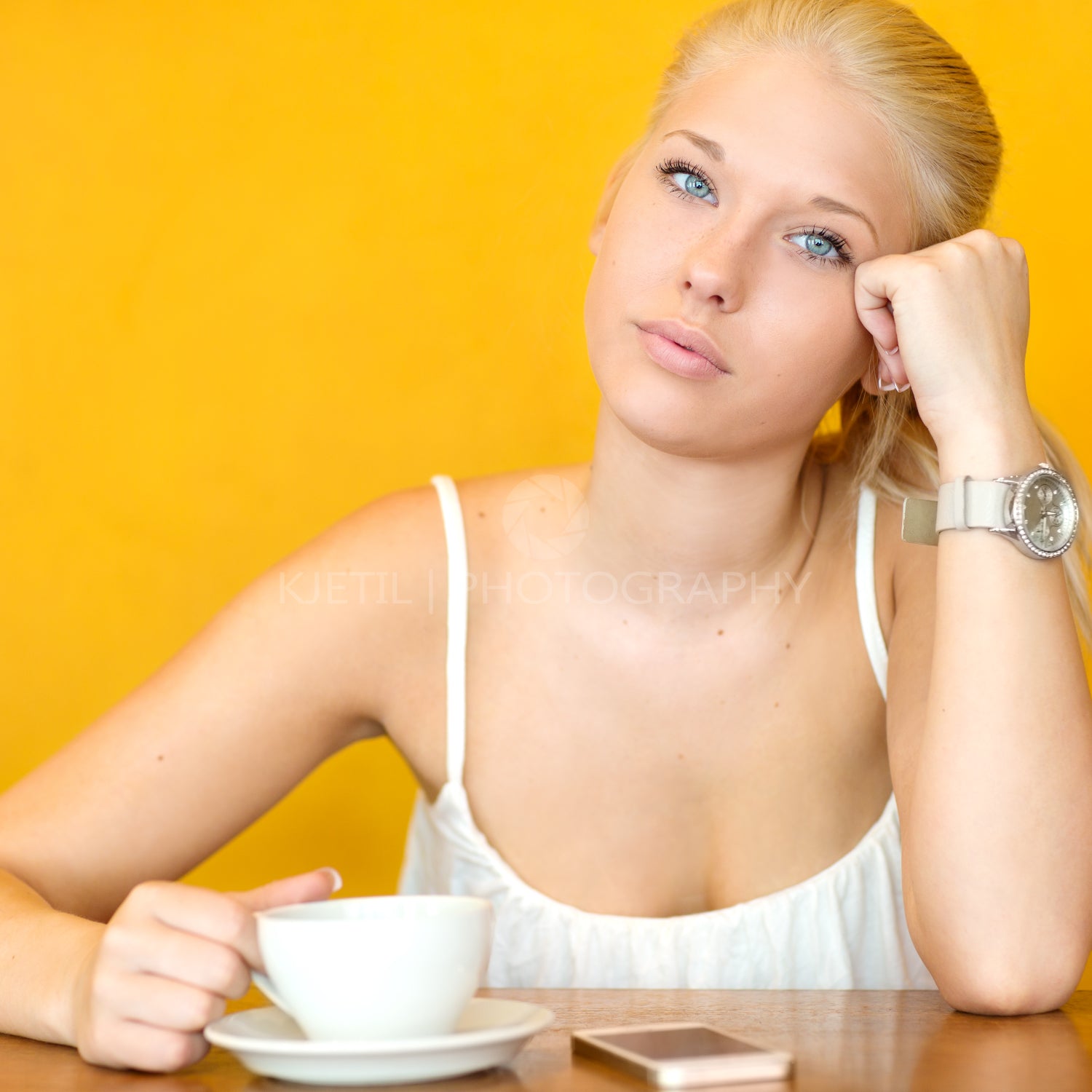 Attractive blonde girl drinking coffee at cafe – kjetil | photography