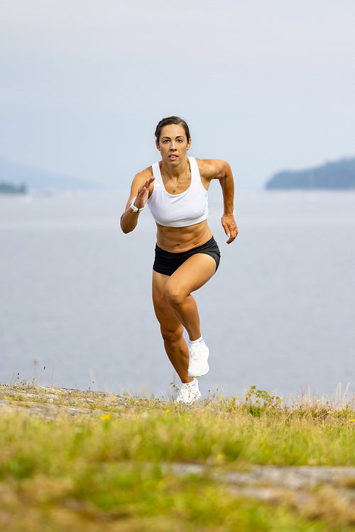 Determined Athlete Sprinting High-Intensity Intervall Workout in Beautilful Nature