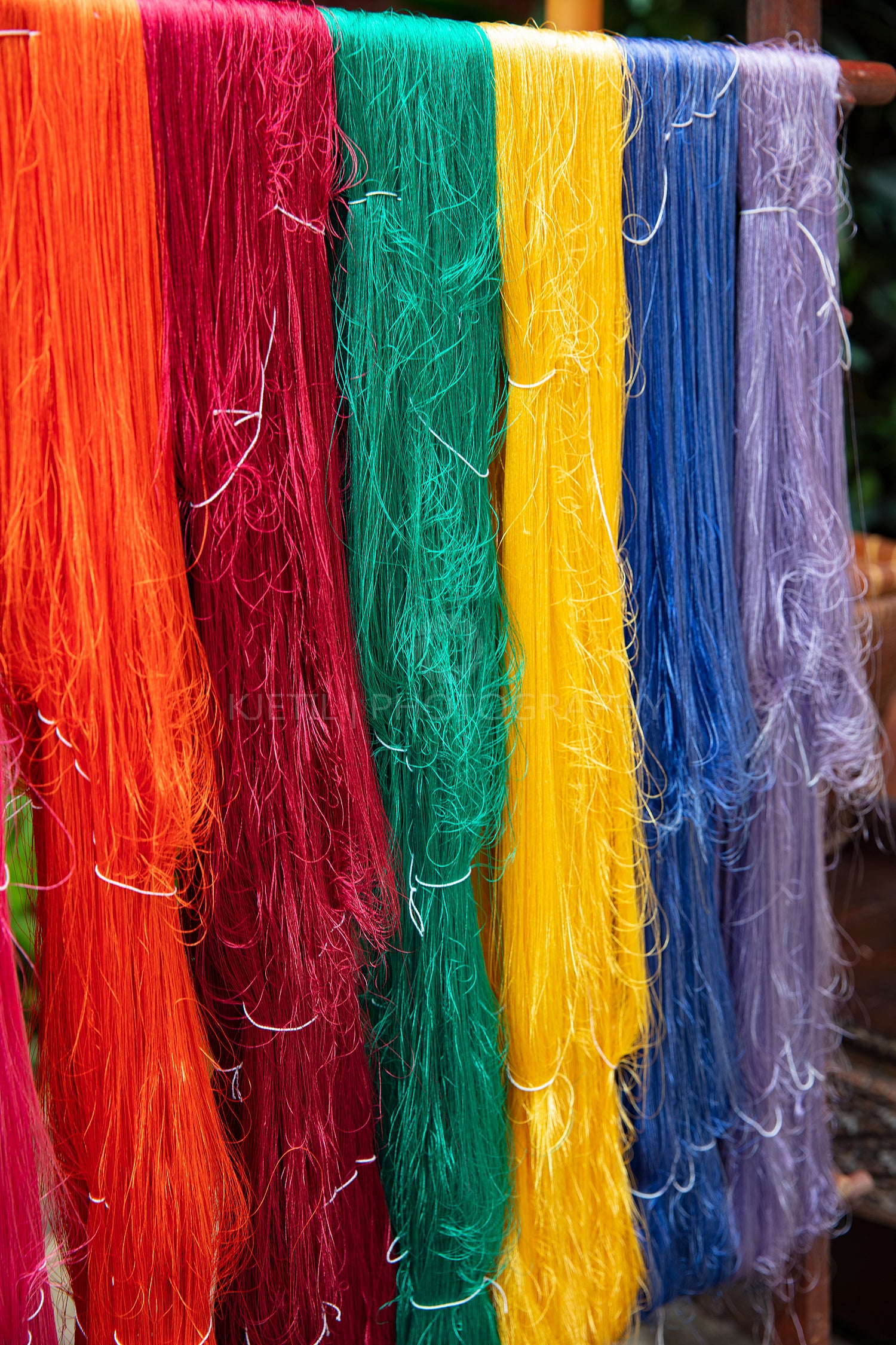 Colorful Silk Yarns Hanging In Manufacturing Factory