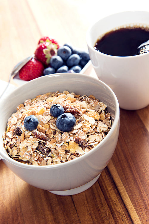 Breakfast bowl of muesli with fresh berries