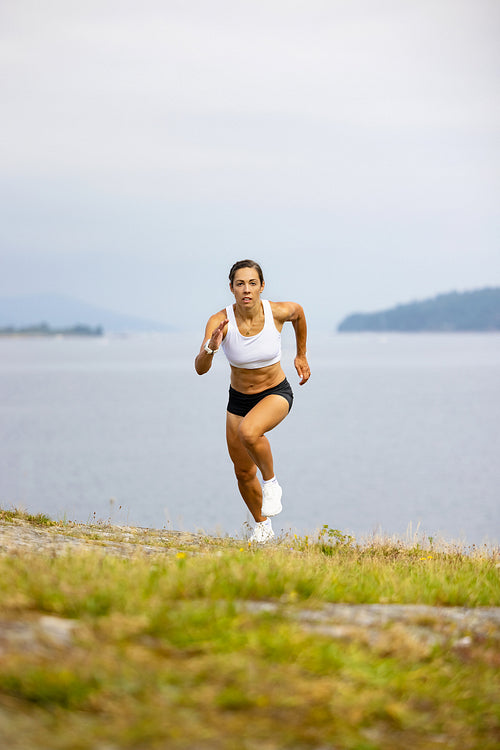 Determined Athlete Sprinting High-Intensity Intervall Workout in Beautilful Nature