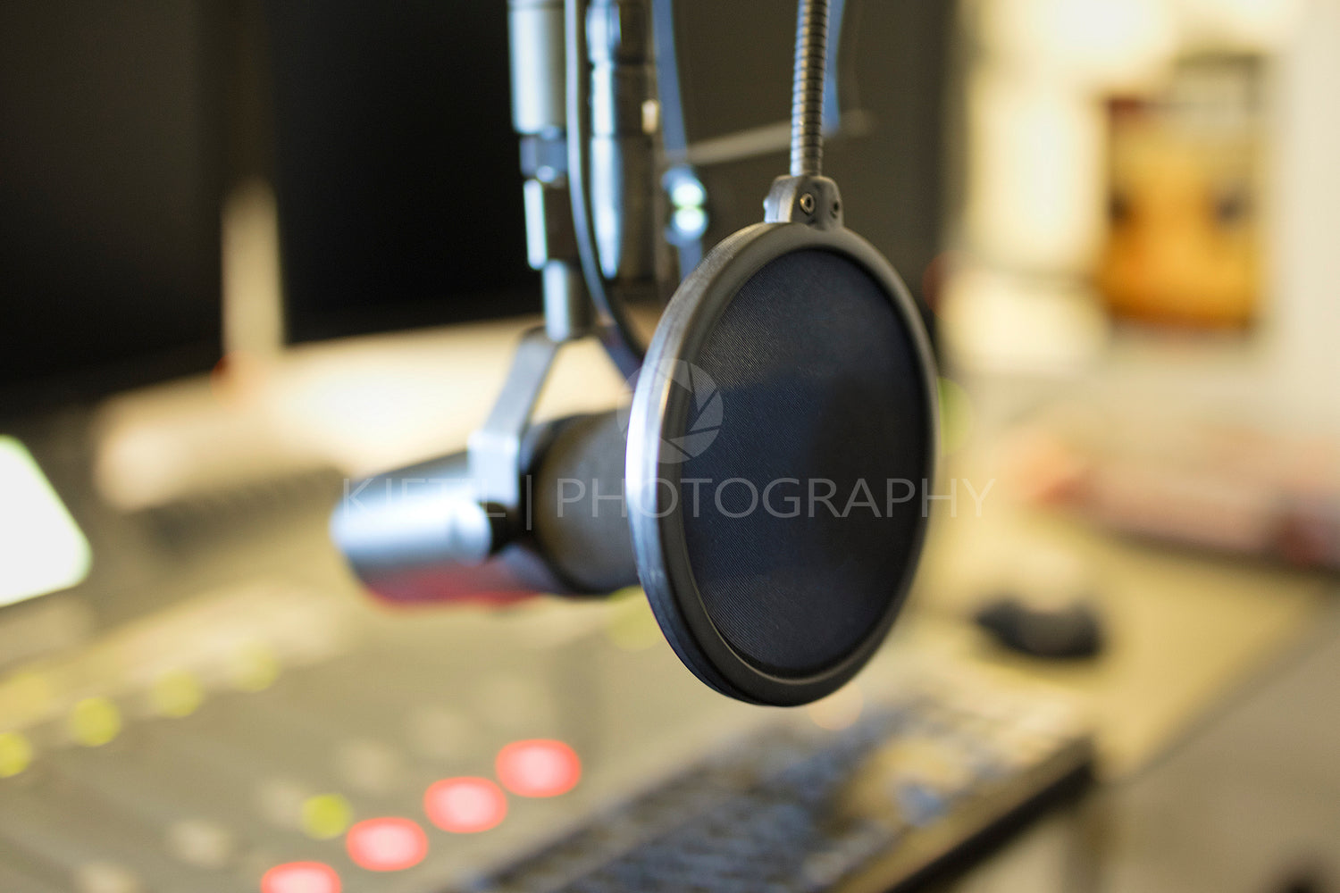 Close-up of a microphone in radio station broadcasting studio
