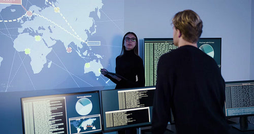 Cyber security team working in a Cyber Security Operations Center SOC to protect systems and technologies