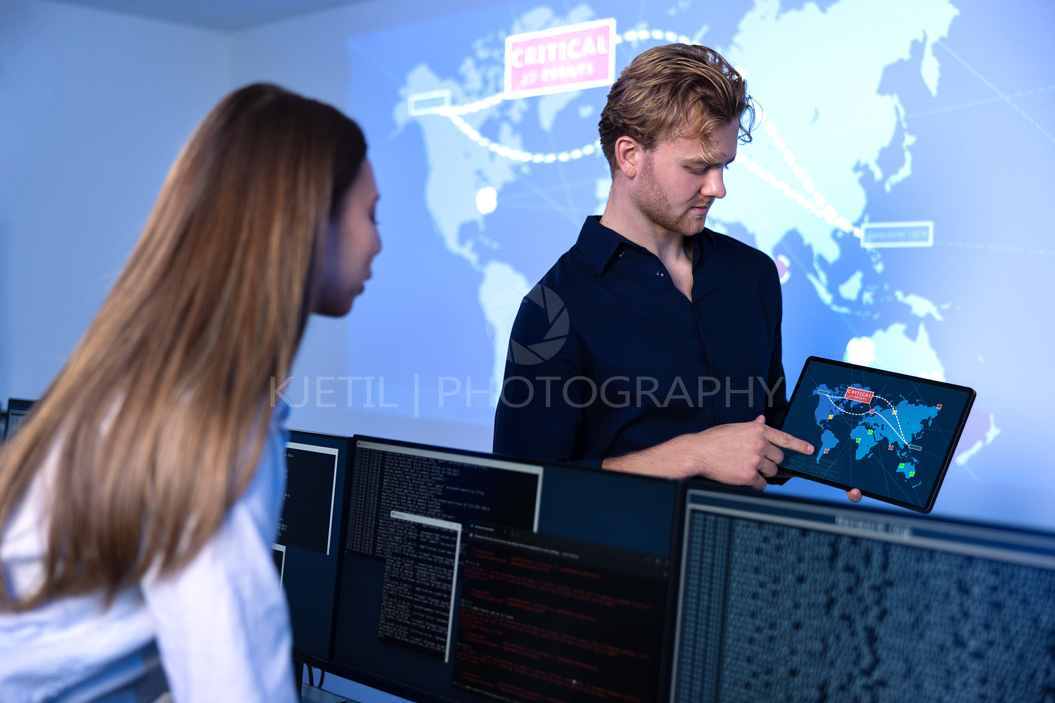 Cyber security team working in a Cyber Security Operations Center SOC to protect systems and technologies