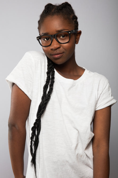 Female Model With Braided Hair Over Gray Background