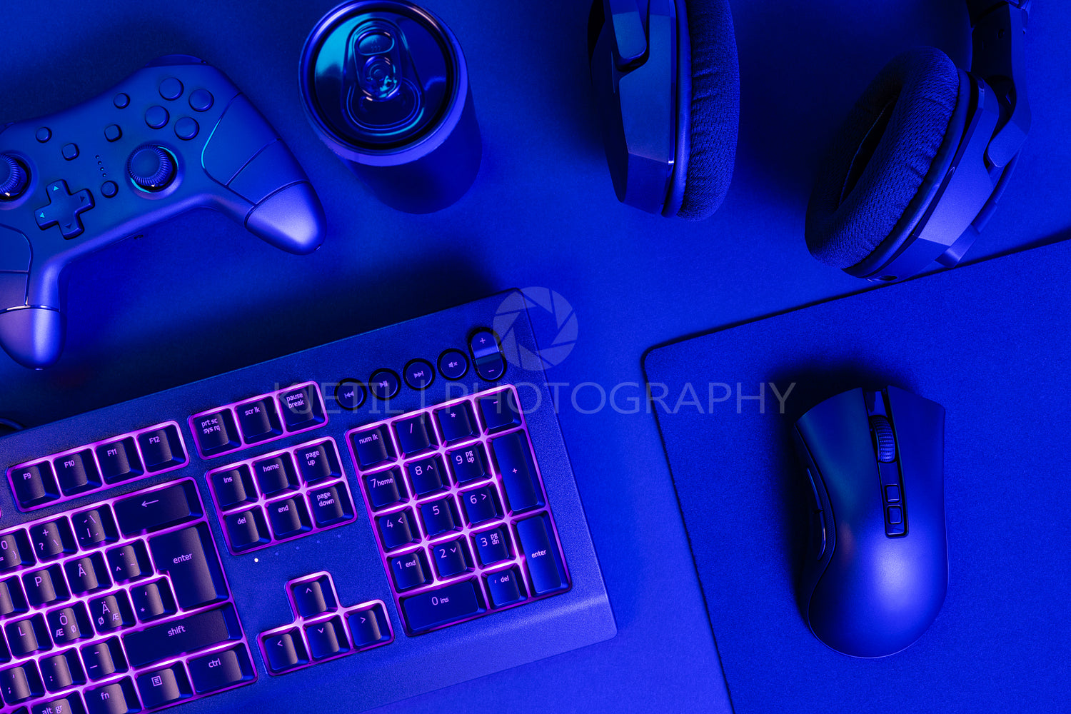 Purple lit keyboard by various wireless gadgets