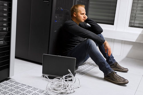 Exhausted IT Consultant in DataCenter