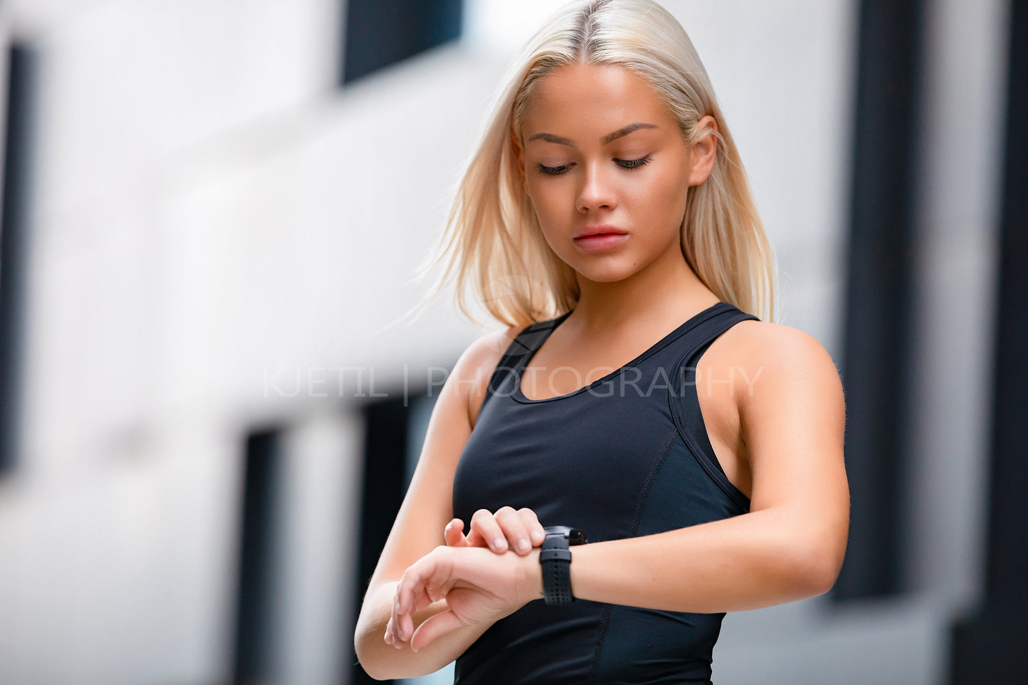 Woman Checking Heart Rate Using Smart watch After Workout