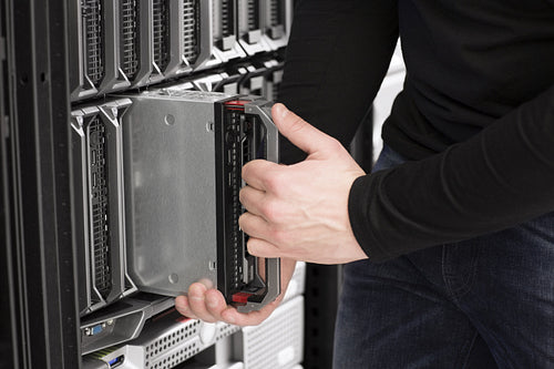 IT Engineer installs Blade Server in Data Center