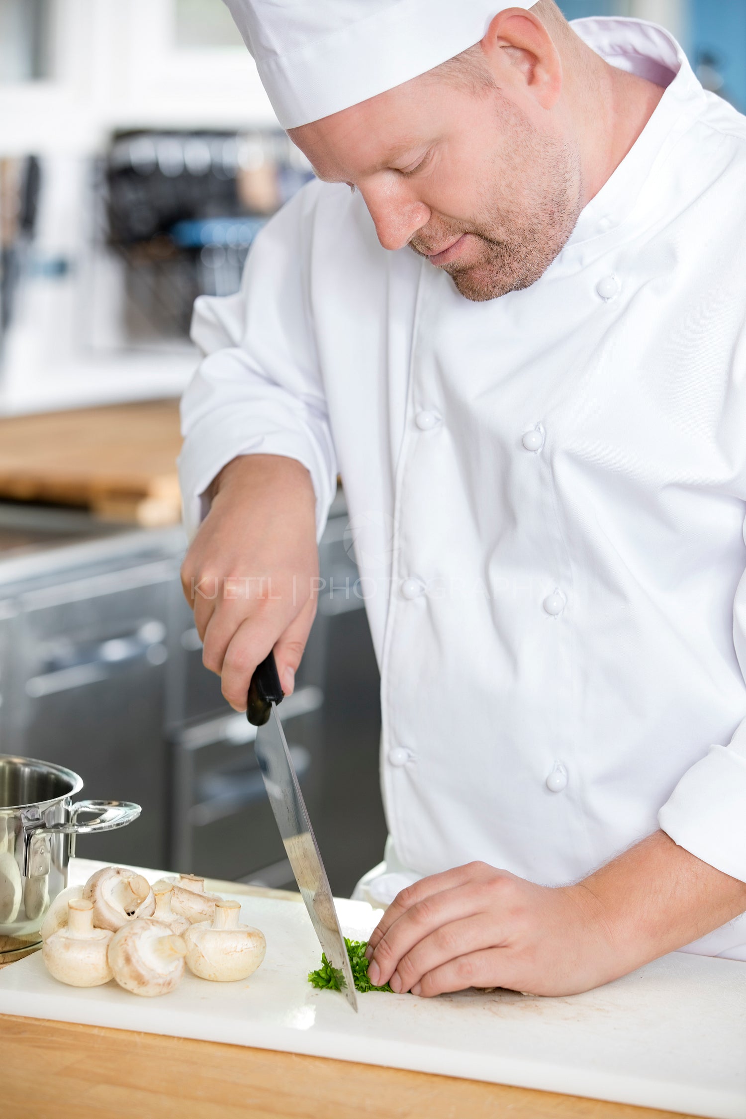 Professional chef preparing vegetables to a healthy dish