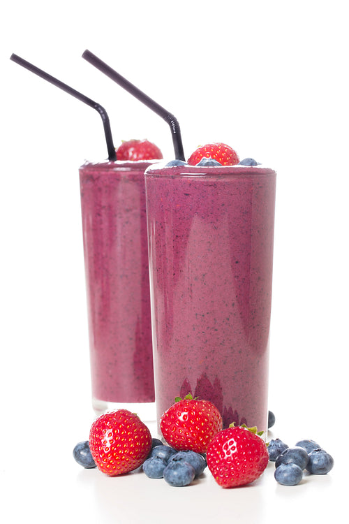 Two glasses of fresh berry smoothie