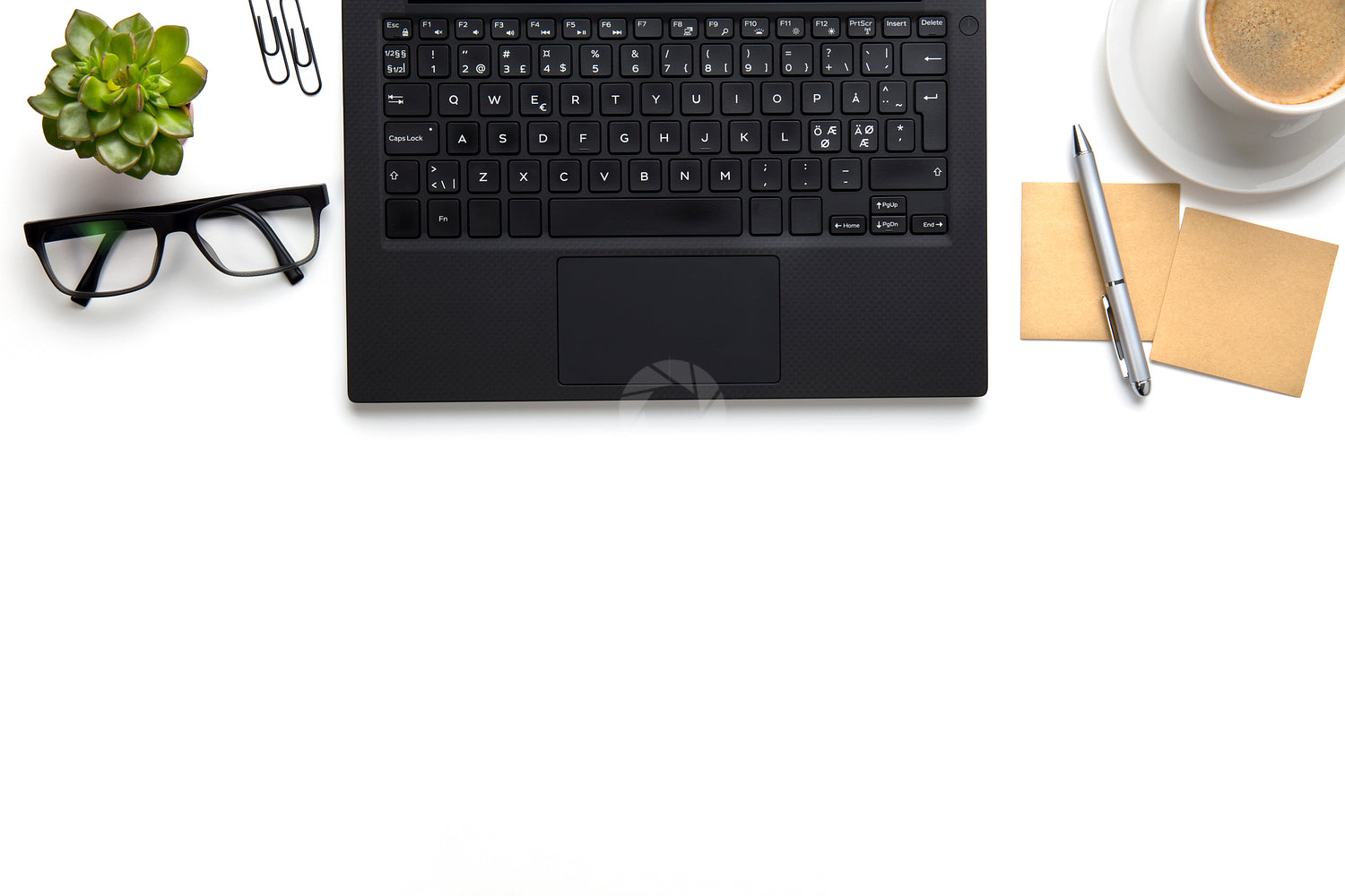 Laptop With Eyeglasses, Coffee Cup And Notes On White Desk