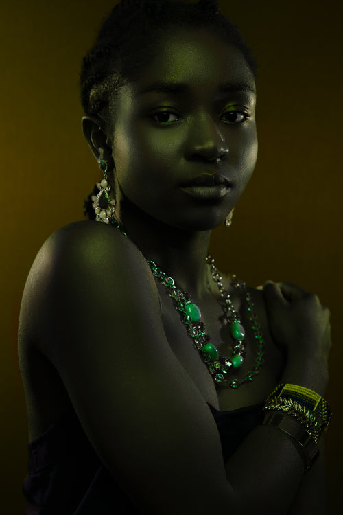 Black Beautiful Woman Wearing Jewelry Over Brown Background
