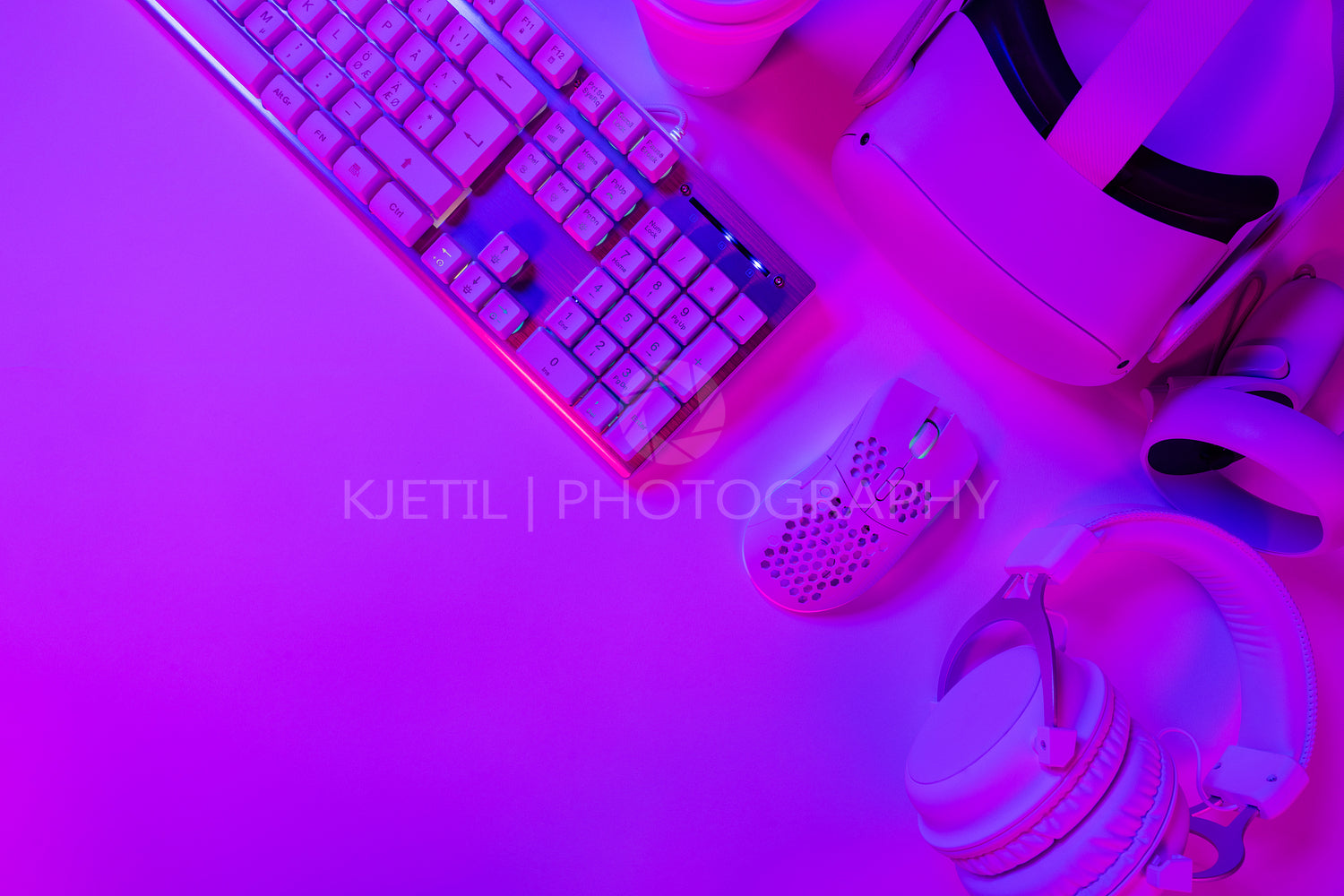 Keyboard with mouse and headphones on gaming desk