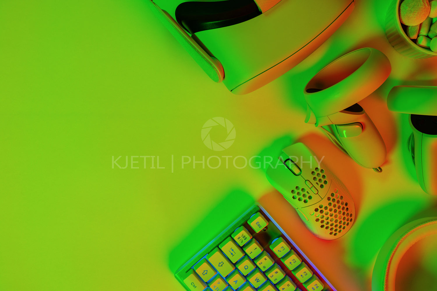 Modern gaming accessories on green desk