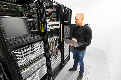 It engineer maintains servers in datacenter