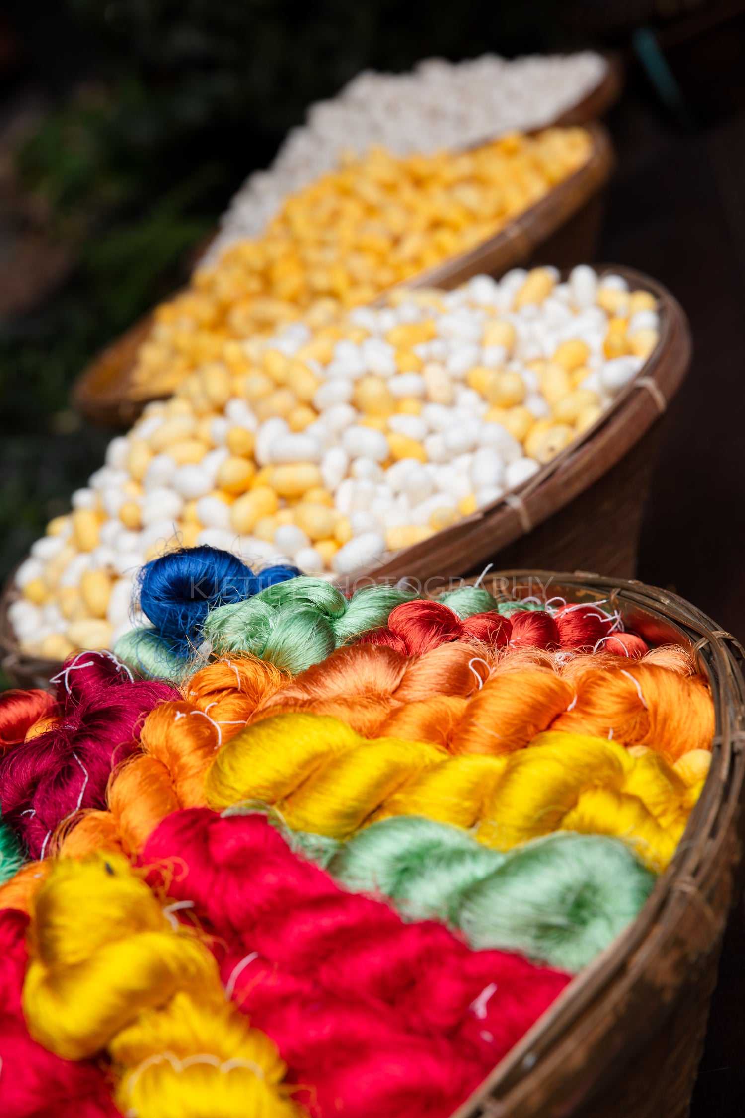 Colorful Thai Silk Threads And Cocoons In Baskets
