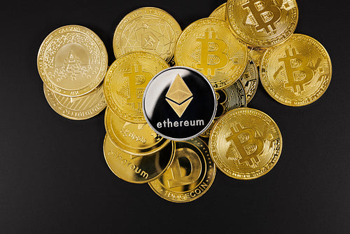 Ethereum coin on top of various cryptocurrencies