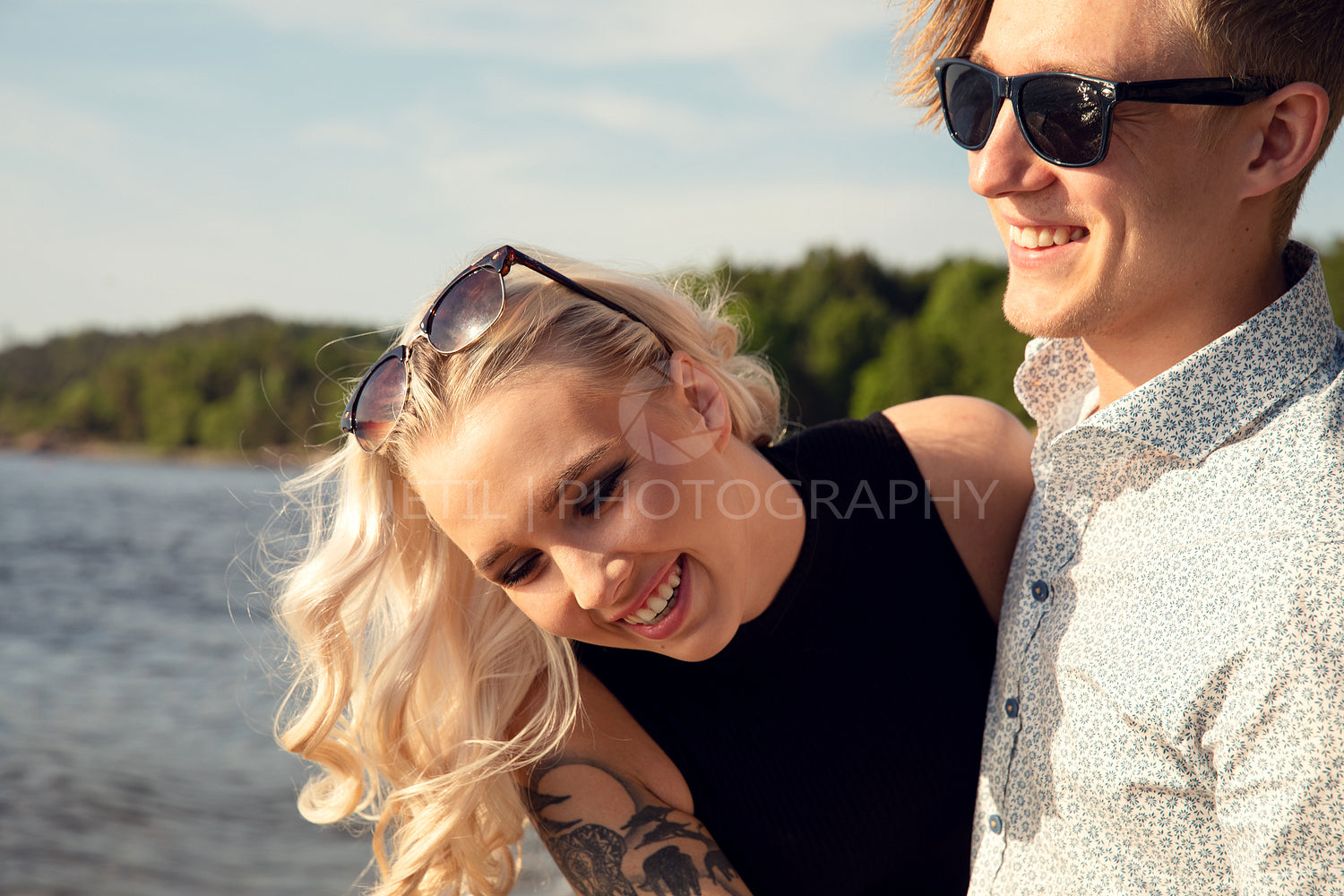 Young Couple Enjoying Summer Vacation At Beach