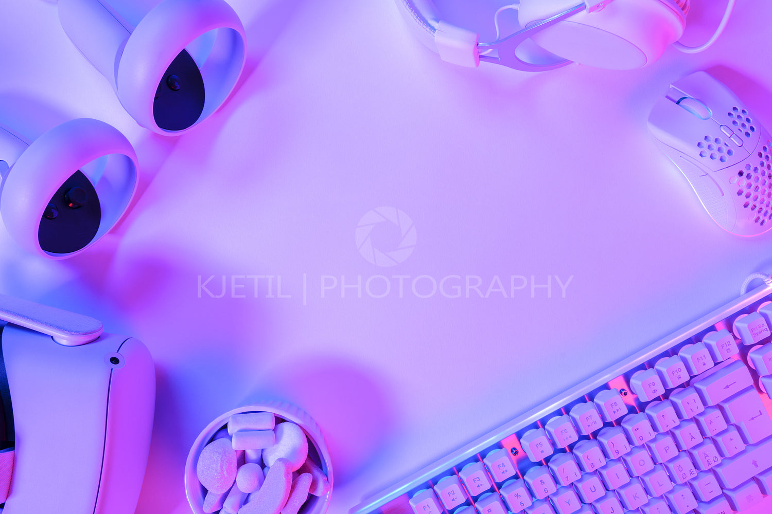 Gaming accessories on purple desk
