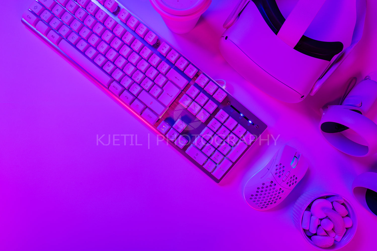 Keyboard with mouse and headphones on desk