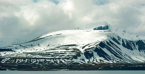 Snowy mountain landscape in cold arctic environment