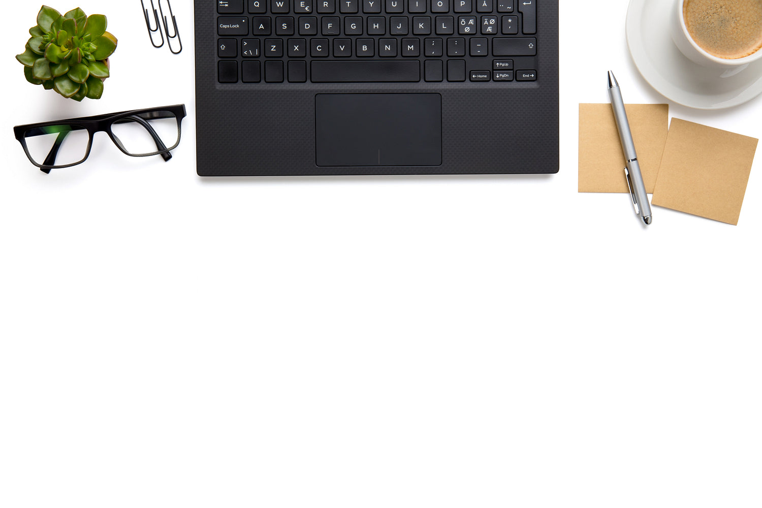 Laptop With Eyeglasses, Coffee Cup And Adhesive Notes On Isolated White