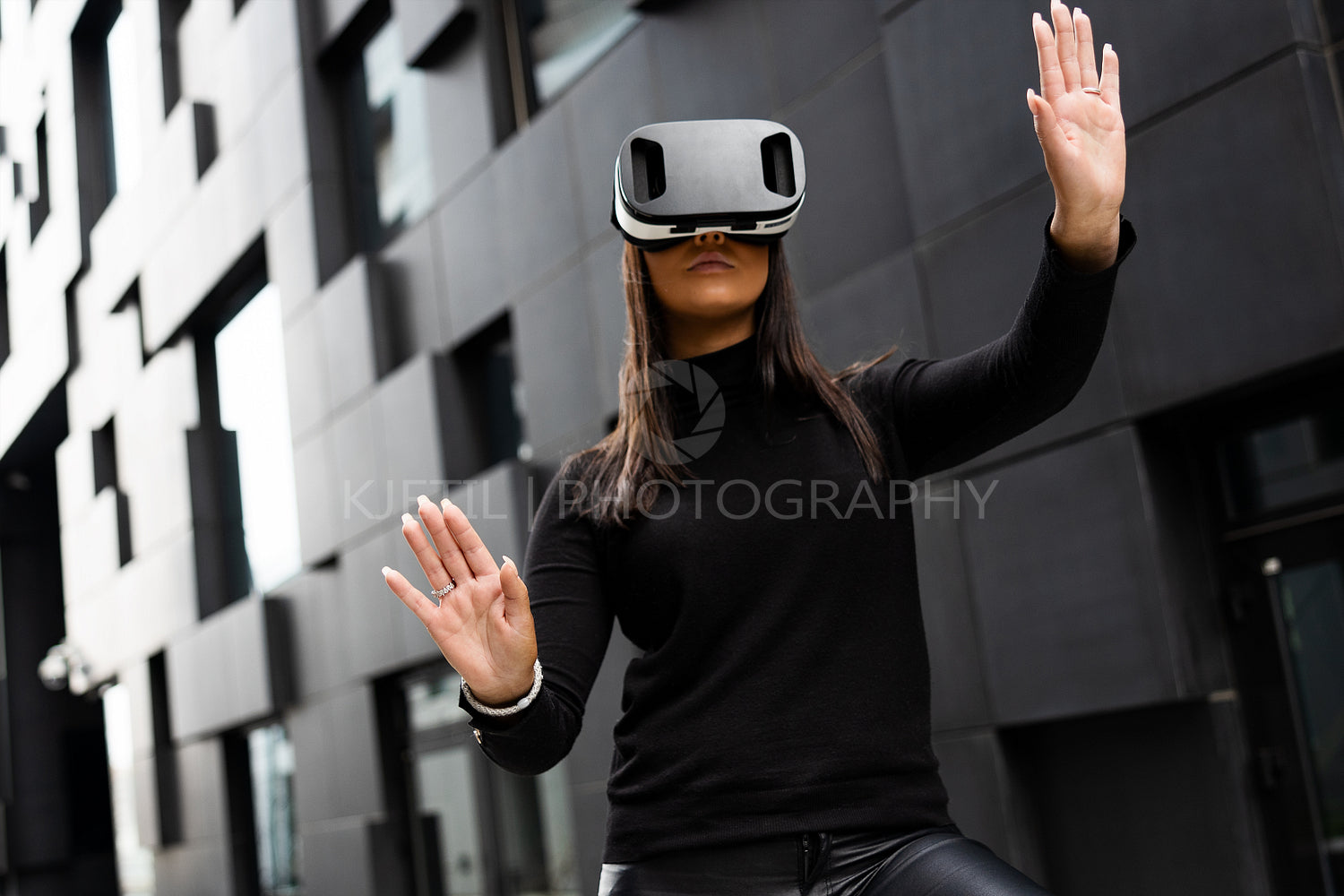 Female Using Virtual Reality Glasses And Wearing Black In Futuristic City