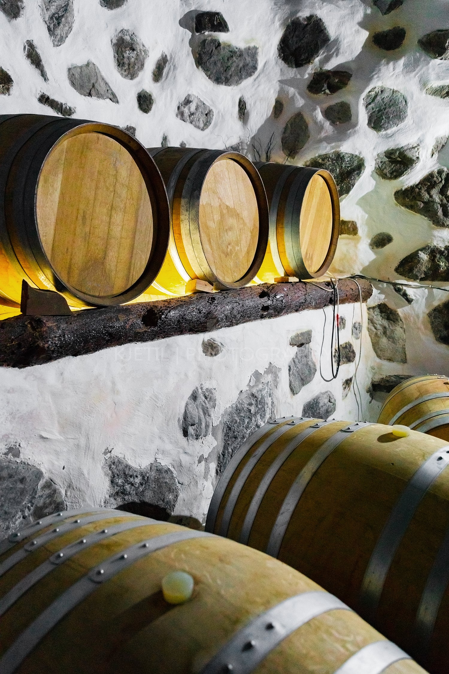 Wooden Barrels in Stored At Wine Cellar Under Ground