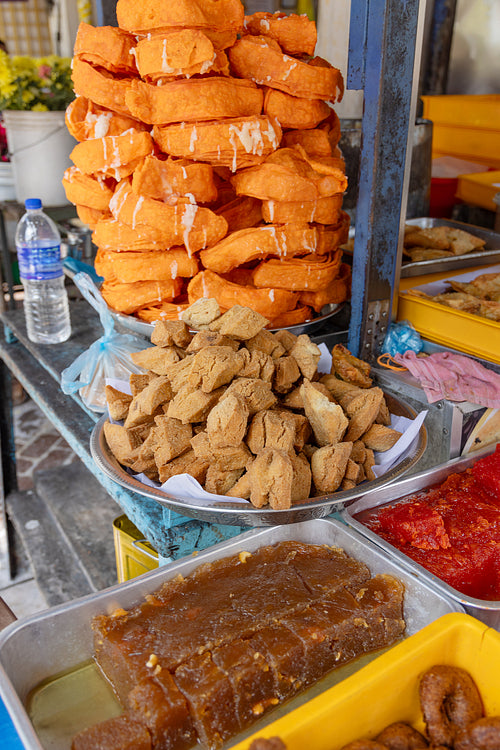 Delicious snacks and sweets at a street food stall in Asia