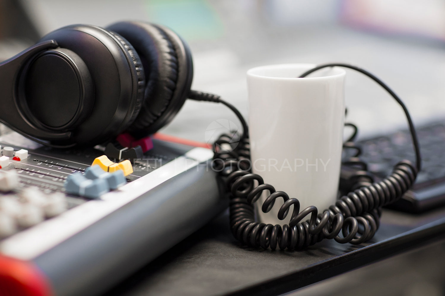 Headphones With Spiral Cord In Radio Studio