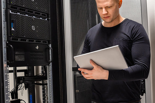 Professional IT Support Using Digital Tablet By Servers In Datacenter