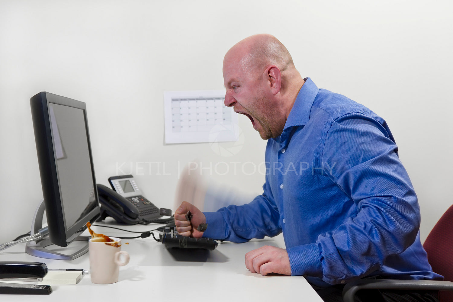 Angry Worker hit his keyboard