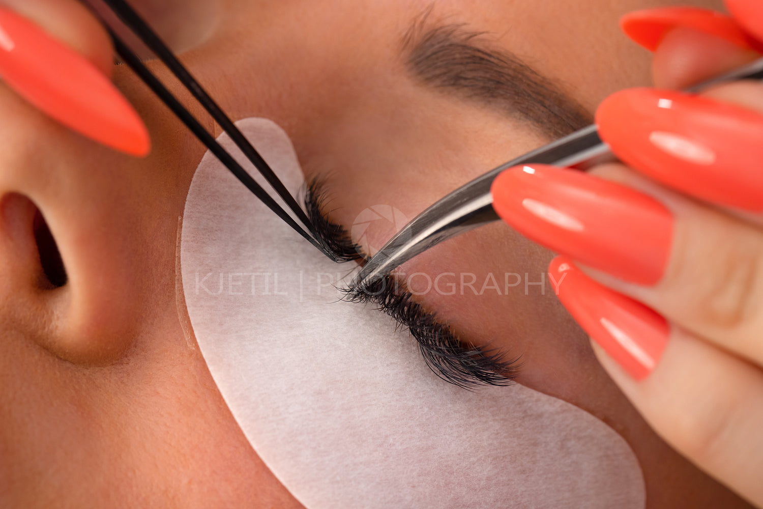 Hands Of Cosmetologist Using Tweezers For Applying False Eyelashes