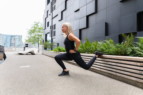 Fit Woman Do Lunge Workout Outdoor in the City