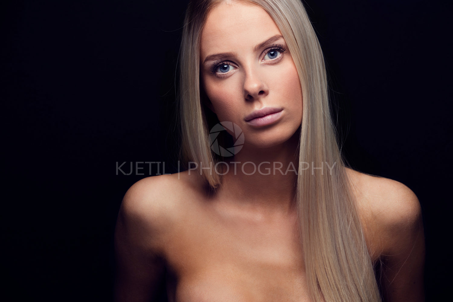 Portrait of a beautiful young woman with blonde hair