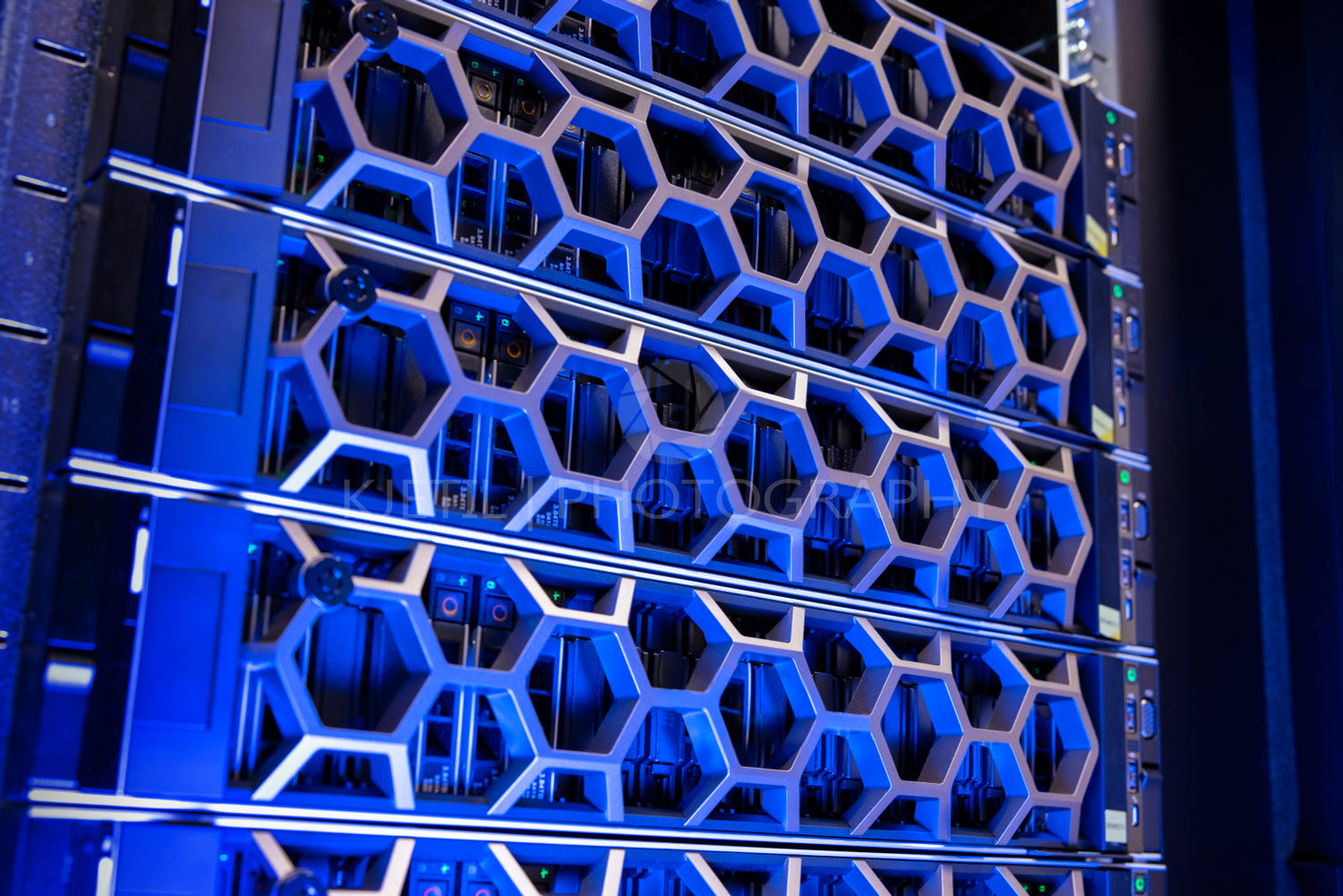 Closeup Of Modern Hard Drives In Illuminated Blue Virtual Datacenter
