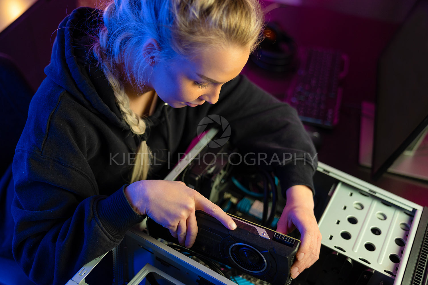 E-sport Gamer Girl Installing New GPU Video Card in Her Gaming PC