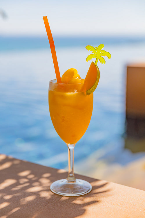 Mango Juice In Glass At Poolside