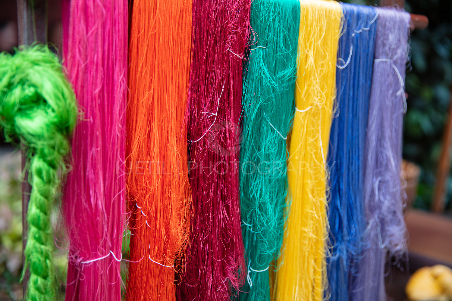 Colorful Silk Yarns Hanging At Manufacturing Factory