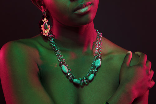Colorful and creative portrait of african womans upper body with dark skin