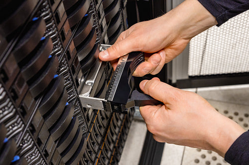 IT Professional Replacing Hard Disk In San At Datacenter