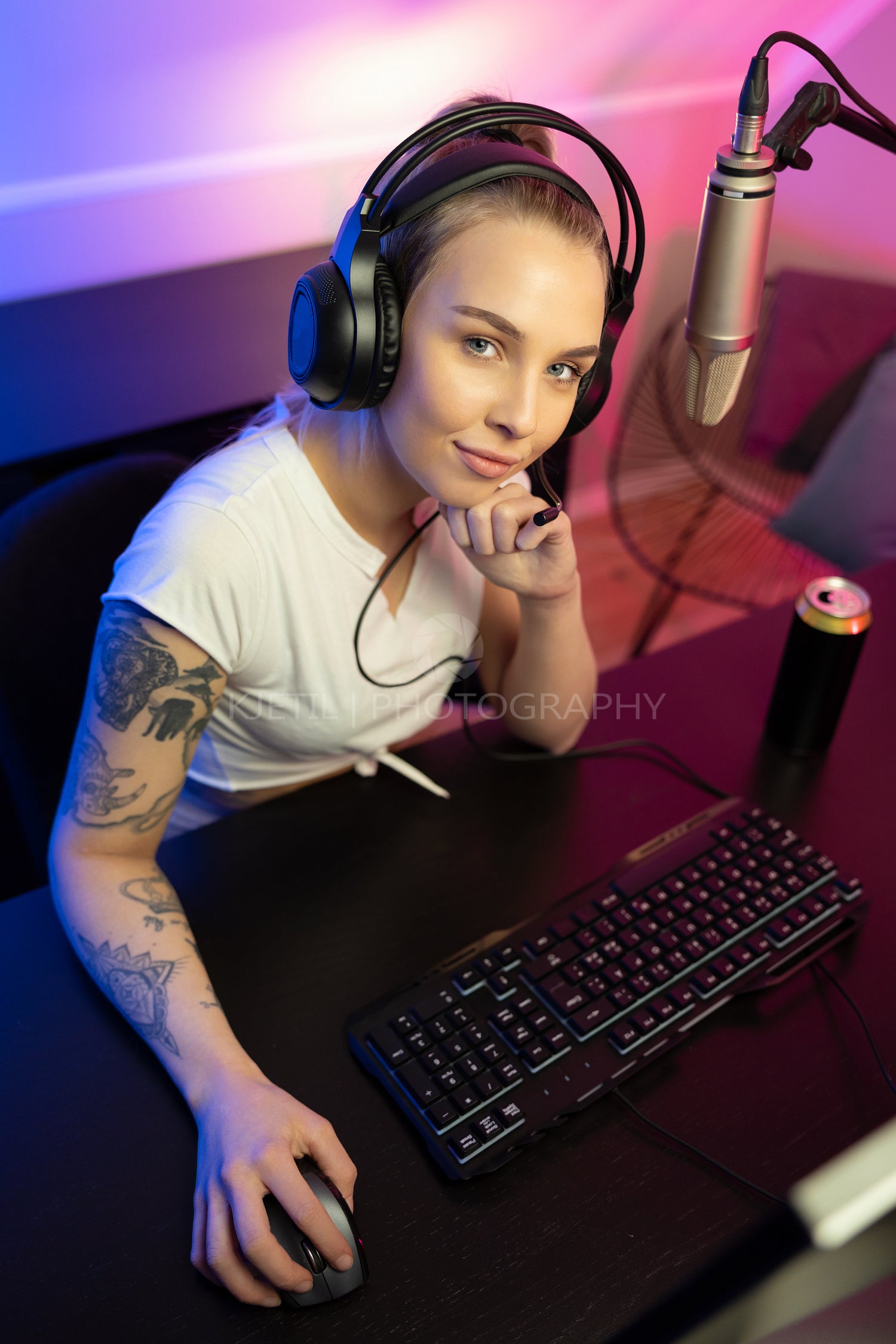 E-sport gamer girl live streaming and plays online video game on PC