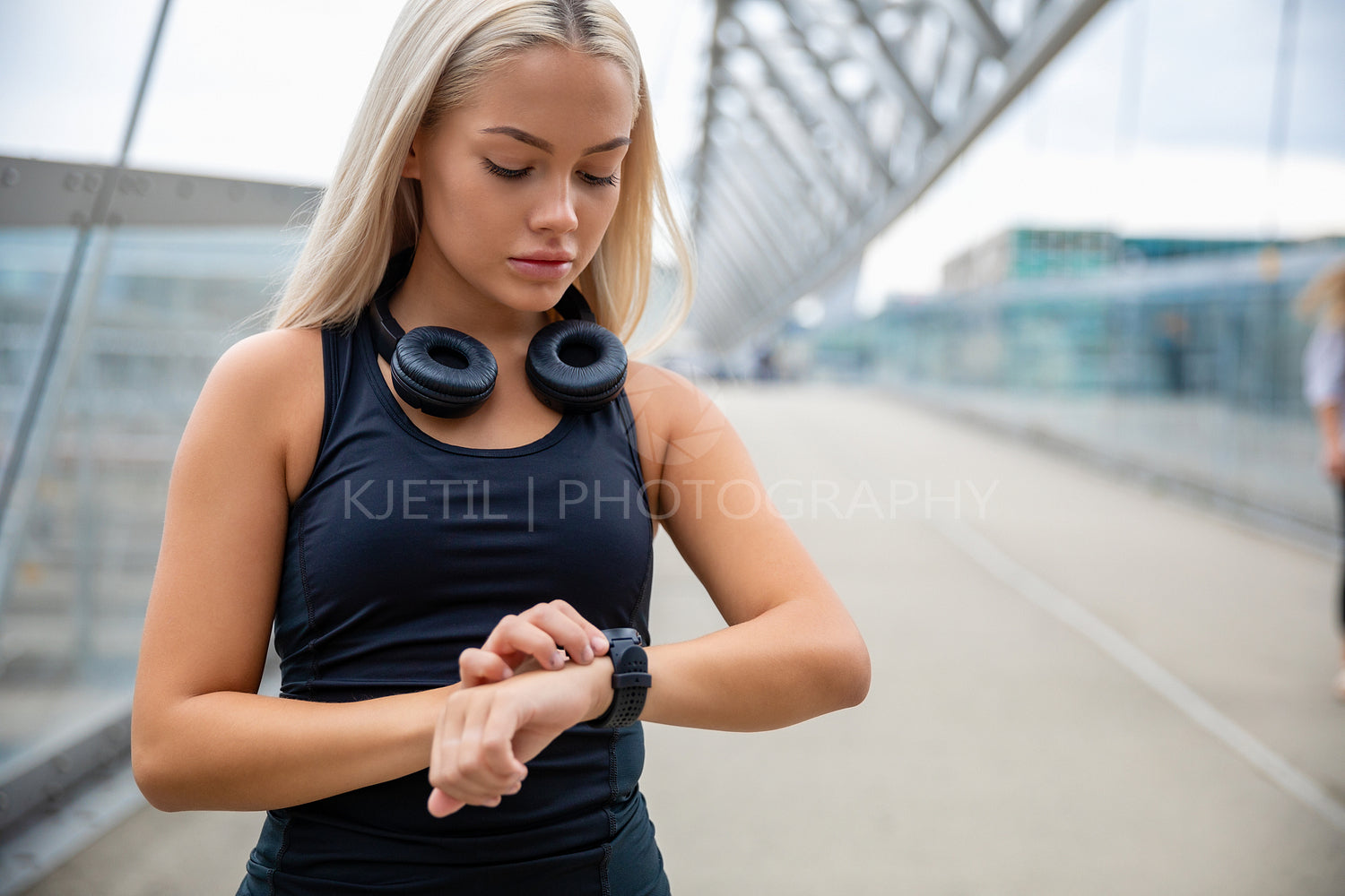 Woman Checking Heart Rate Using Smartwatch After Workout On Brid