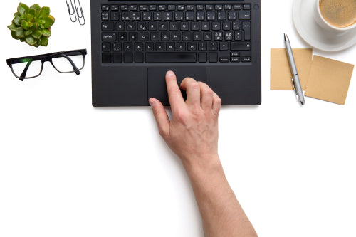 Businessman Touching Touchpad On Laptop On White Isolated Background