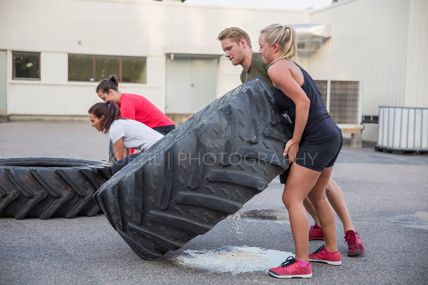 Flipping tractor tires as outdoor workout